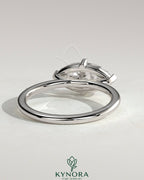 Kynora CJ 2ct marquise east-west claw solitaire engagement ring with raised basket gallery, showcasing elegant diamond setting.