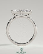 Kynora CJ 2ct marquise east-west claw solitaire engagement ring with raised basket gallery featuring a sparkling diamond.