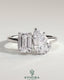 Kynora CJ 1.8ct emerald and 1.5ct pear-shaped diamonds Toi et Moi engagement ring with hidden halo and claw setting.