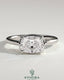Kynora CJ 2ct elongated cushion cut East-West claw solitaire engagement ring with bezel frame showcasing a sparkling diamond.