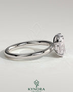 Kynora CJ 1.05ct oval and 1.8ct emerald gemstone Toi et Moi engagement ring with claw settings, elegant and sparkling jewelry piece