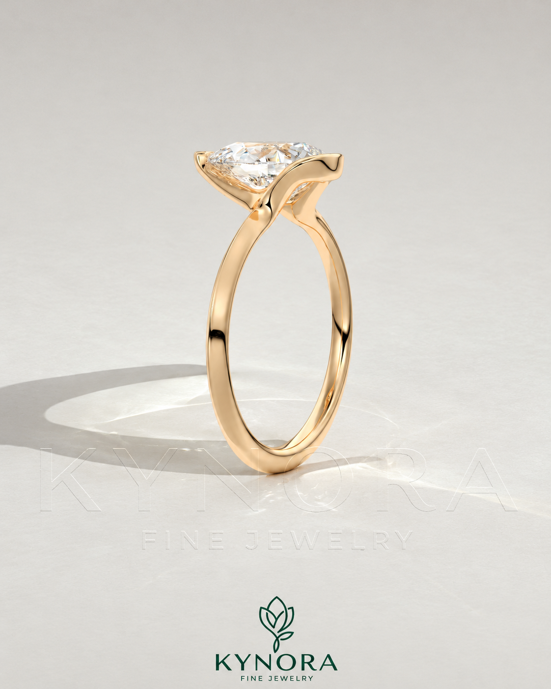 Pear cut moissanite half-bezel engagement ring in 925 silver with intricate band detail, showcasing elegant jewelry craftsmanship.