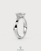 East-West Marquise Moissanite solitaire ring in sterling silver featuring a prominent marquise-cut stone.