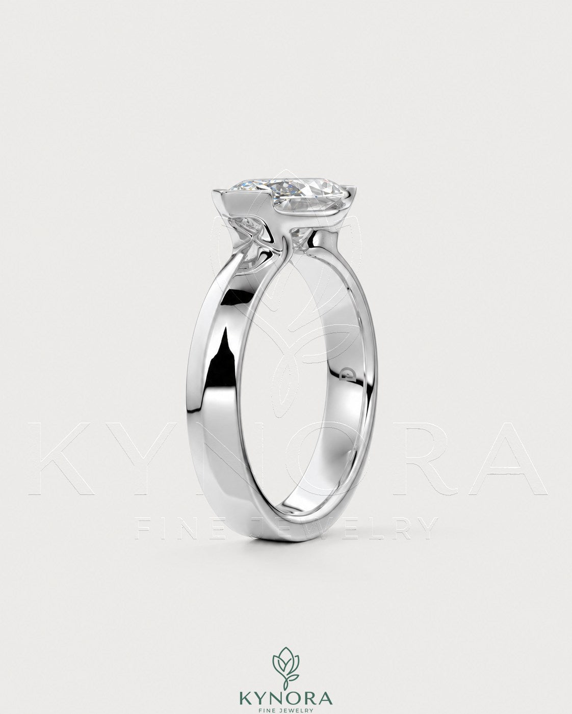 East-West Marquise Moissanite solitaire ring in sterling silver featuring a prominent marquise-cut stone.