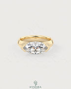 East-West marquise moissanite solitaire ring in sterling silver, featuring a sparkling central stone with a sleek, elegant design.