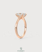 Sterling silver solitaire engagement ring with a cushion cut moissanite gemstone, featuring a sleek and elegant design.