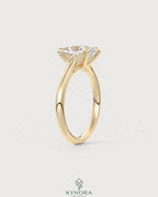 Cushion cut moissanite solitaire engagement ring in 925 sterling silver featuring a prominent central gemstone and sleek band.