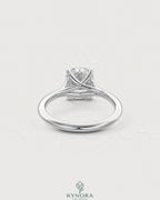 Sterling silver solitaire engagement ring with cushion cut moissanite gemstone, showcasing a sleek and elegant design.