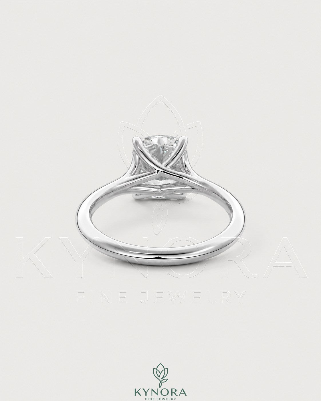 Sterling silver solitaire engagement ring with cushion cut moissanite gemstone, showcasing a sleek and elegant design.