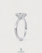 Cushion cut moissanite solitaire engagement ring in 925 sterling silver with a classic, elegant design.