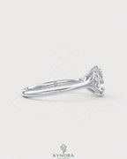 Cushion cut moissanite solitaire engagement ring in 925 sterling silver, featuring a sparkling center stone and elegant band.