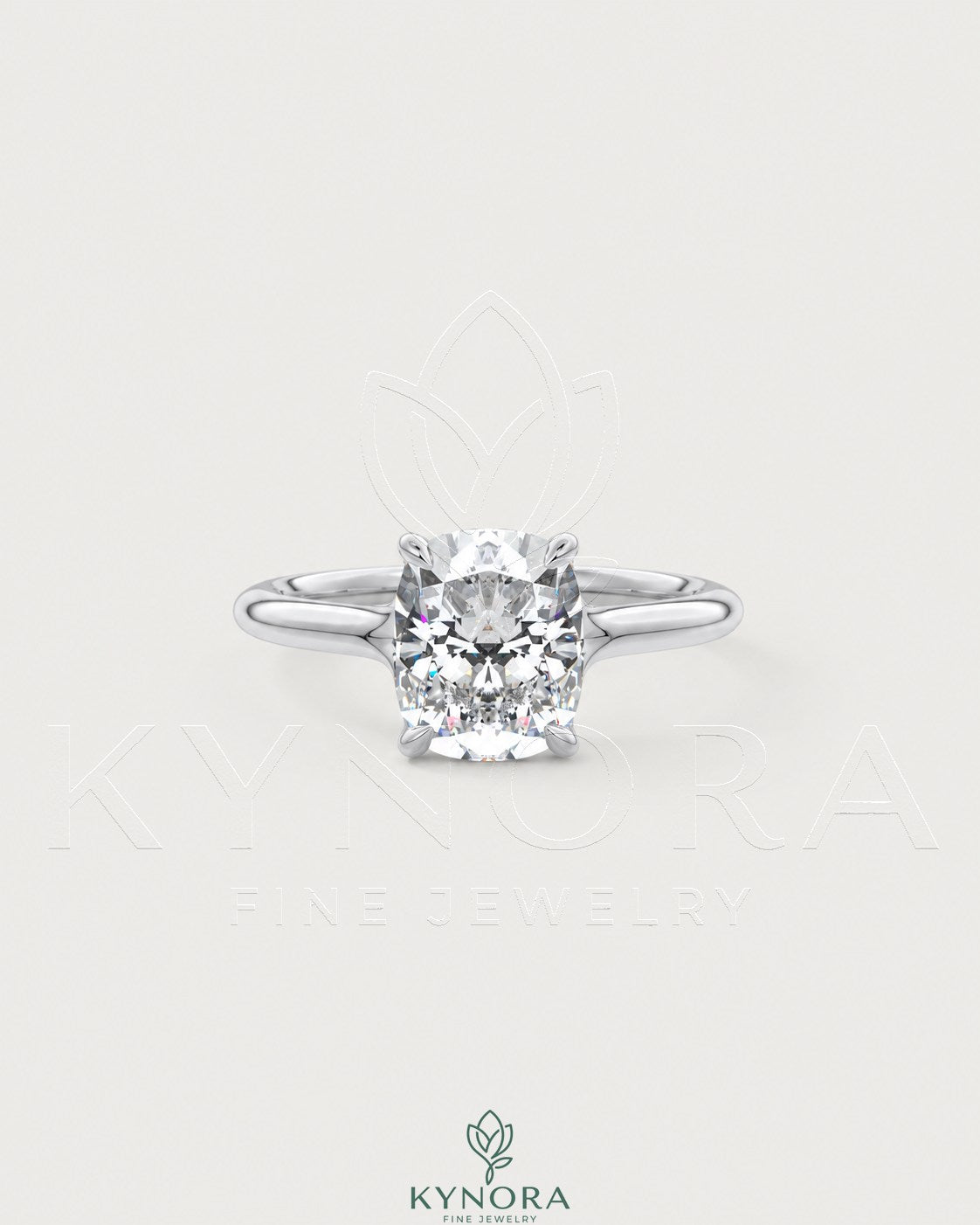 Sterling silver solitaire engagement ring with cushion cut moissanite gemstone, featuring a sleek and elegant design by Kynora CJ.