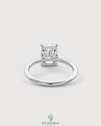 Radiant cut moissanite solitaire engagement ring in 925 silver with a sleek band and sparkling gemstone.