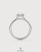 Radiant cut moissanite solitaire engagement ring in 925 silver with a sleek band, showcasing a sparkling central gemstone.