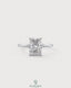 Radiant cut moissanite solitaire engagement ring in 925 silver with a sleek band, showcasing a sparkling central stone.
