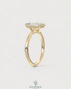 Emerald cut moissanite solitaire engagement ring in 925 sterling silver, featuring a sparkling central gemstone and sleek band.