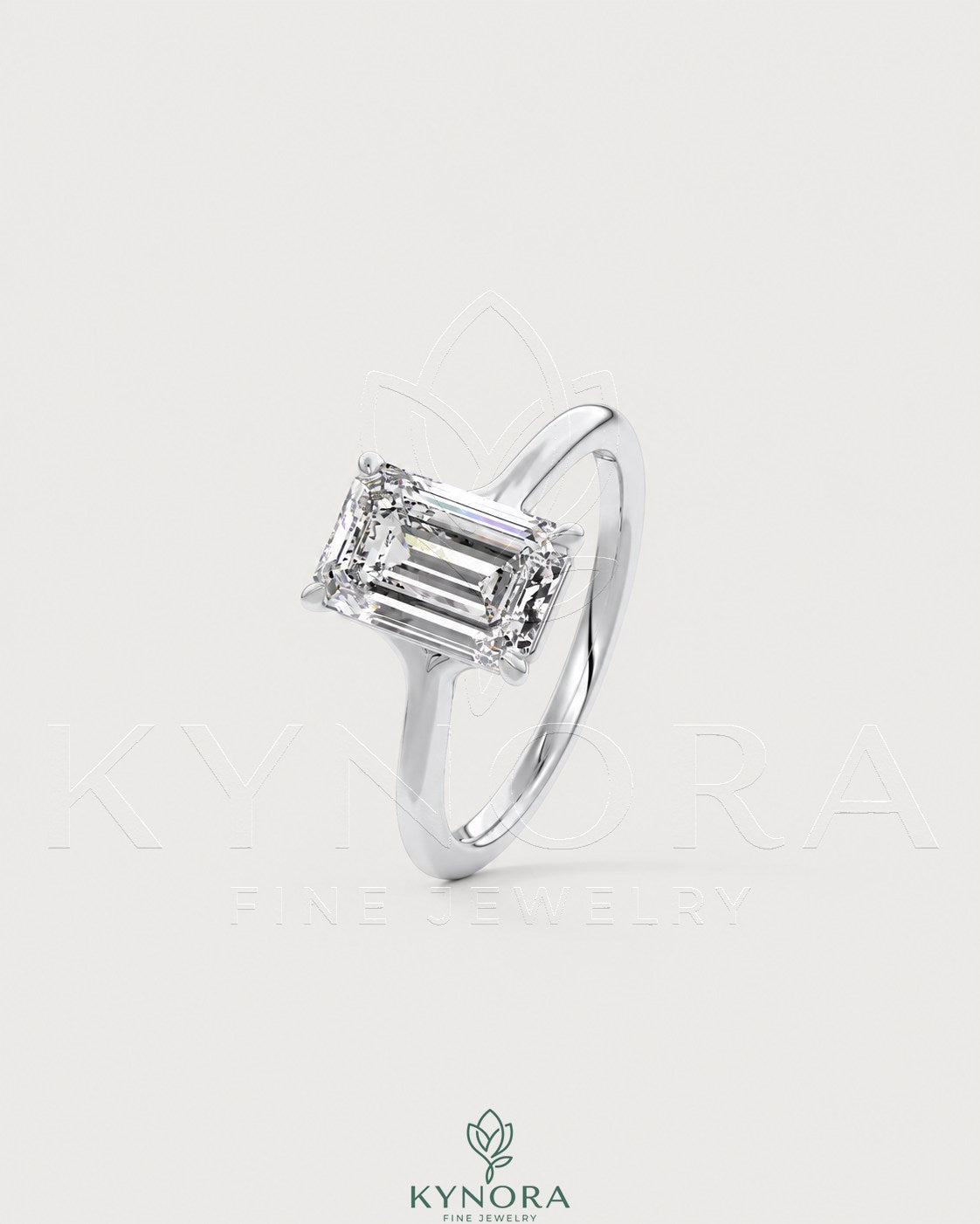 Emerald cut Moissanite solitaire engagement ring in 925 sterling silver with a sleek band and sparkling center stone.
