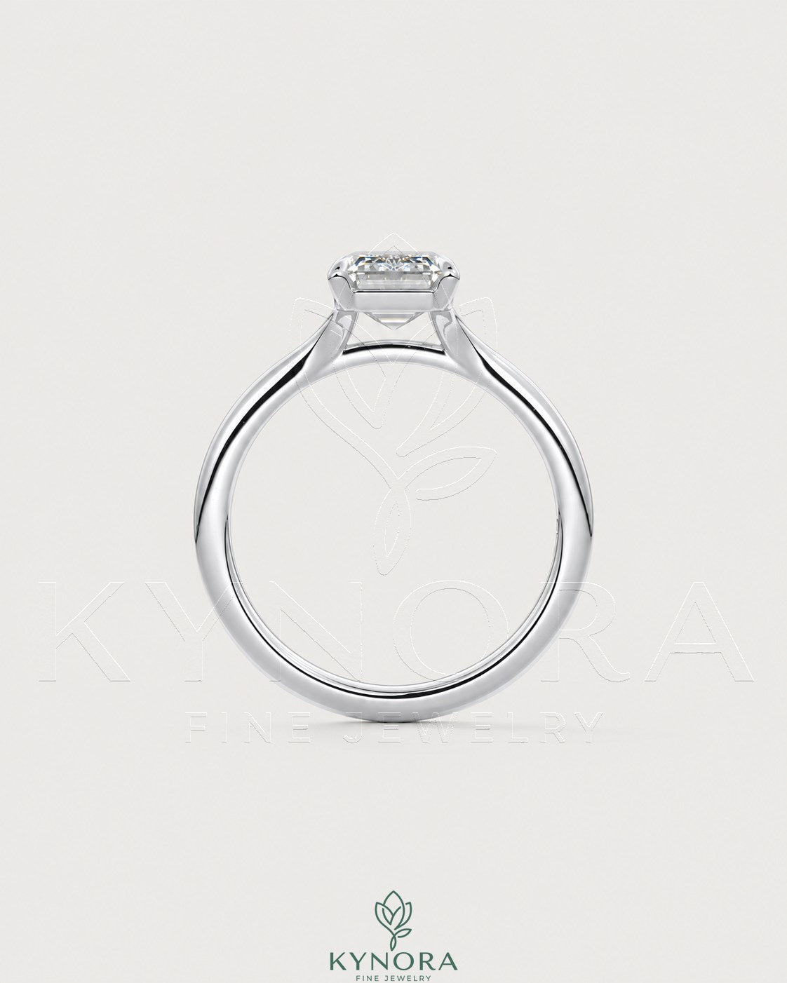 Emerald cut moissanite solitaire engagement ring in 925 sterling silver, featuring a sparkling center stone and sleek band design.