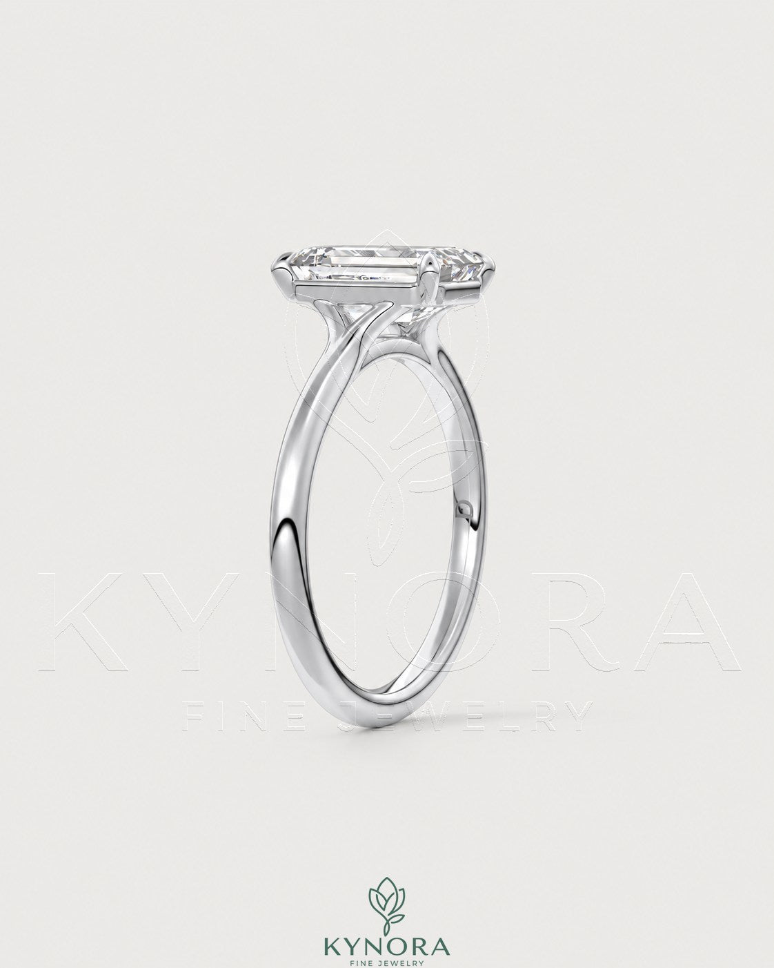 Emerald cut moissanite solitaire engagement ring in 925 sterling silver with a sleek band and sparkling center stone.