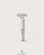 Emerald cut moissanite solitaire engagement ring in 925 sterling silver with a sleek band, by Kynora CJ.