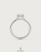 Oval cut moissanite solitaire engagement ring in 925 sterling silver featuring a sleek, elegant design with a sparkling center stone.