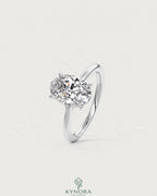 Oval cut moissanite solitaire engagement ring in 925 sterling silver featuring a sleek, elegant design.