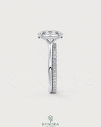 Oval cut moissanite solitaire engagement ring in sterling silver with a sleek band, featuring a sparkling central stone.
