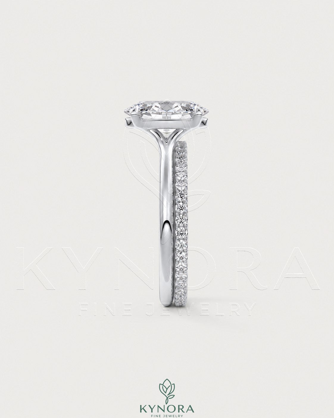 Oval cut moissanite solitaire engagement ring in sterling silver with a sleek band, featuring a sparkling central stone.