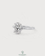 Oval cut moissanite solitaire engagement ring in 925 sterling silver featuring a sleek, elegant design.