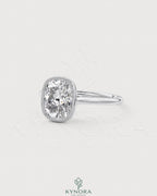 Vintage bezel cushion moissanite engagement ring in 925 silver with milgrain detail, by Kynora CJ.