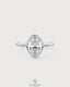 Oval moissanite bezel solitaire engagement ring in 925 silver with a sleek band and sparkling center stone.