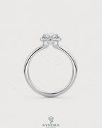 Oval moissanite bezel solitaire engagement ring in 925 silver with a sleek band, featuring a sparkling central stone.
