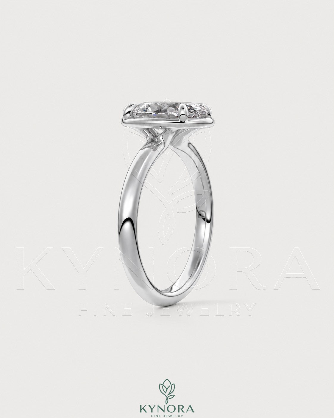 Oval moissanite bezel solitaire engagement ring in 925 silver with a sleek, elegant design from Kynora CJ.