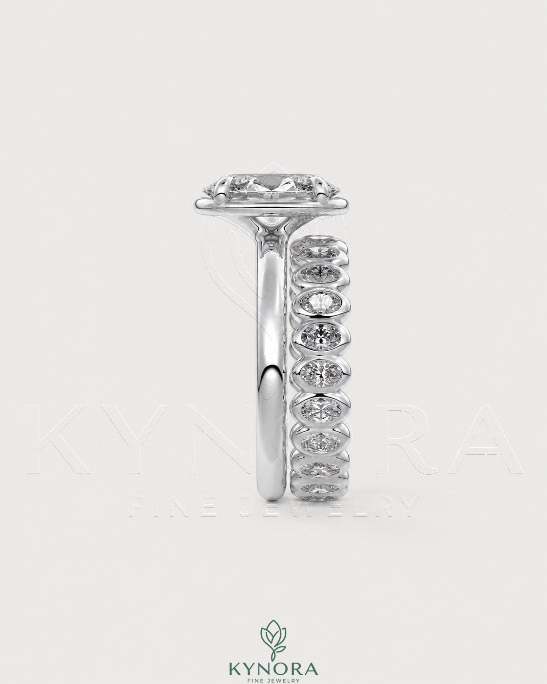 Oval moissanite bezel solitaire engagement ring in 925 silver with a sleek, polished design by Kynora CJ.