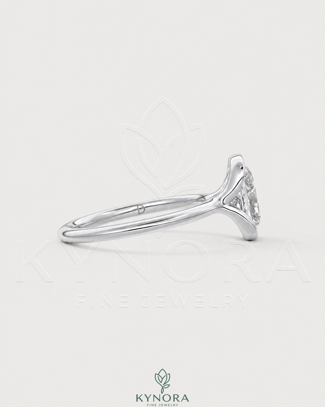 Elongated moissanite half-bezel solitaire ring in 925 silver with a sleek, modern design from Kynora CJ.
