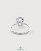 Elongated silver bezel solitaire ring with moissanite stone, crafted in 925 silver by Kynora CJ.