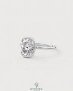 Elongated moissanite half-bezel solitaire ring in 925 silver, showcasing elegant craftsmanship and a sleek design.