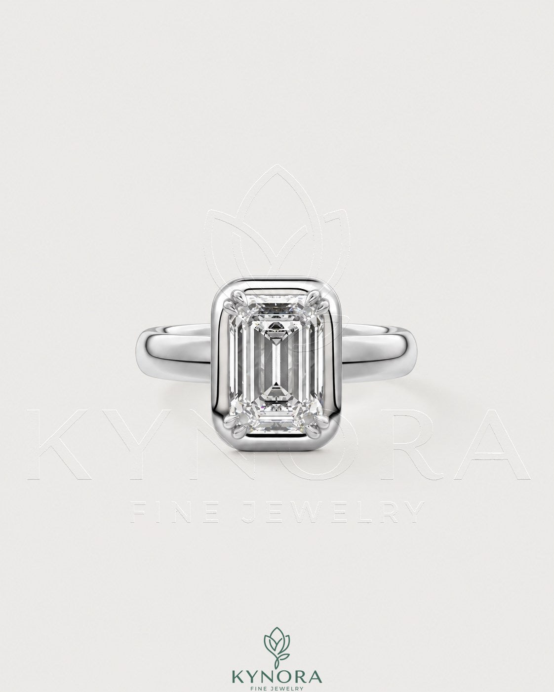 Emerald cut moissanite bezel engagement ring in 925 silver with a sleek band, designed by Kynora CJ. Main image