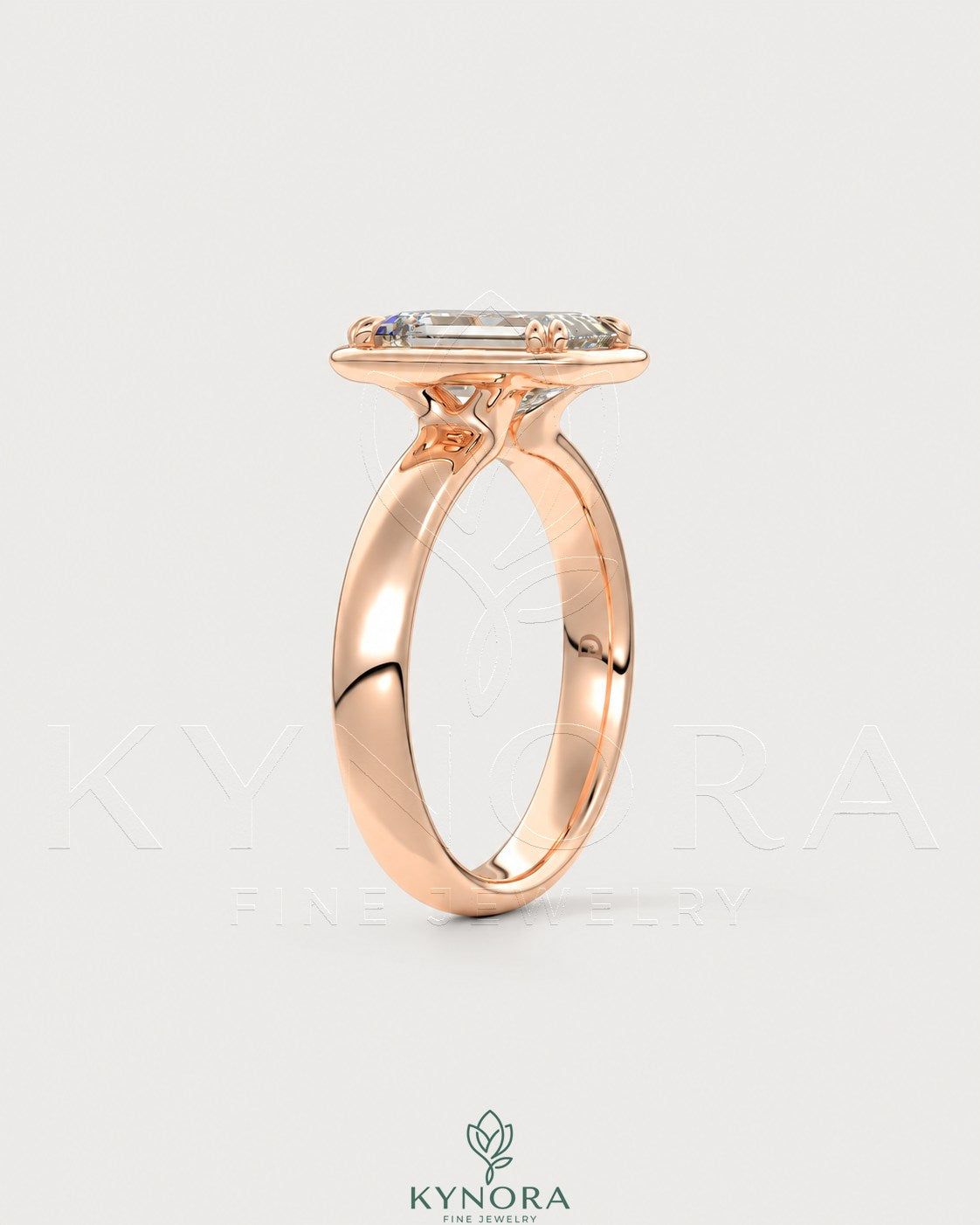 Emerald cut moissanite bezel engagement ring in 925 silver with a sleek band and sparkling center stone.