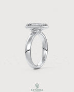 Emerald cut Moissanite bezel engagement ring in 925 silver with a sleek design, featuring a sparkling central stone and smooth band.