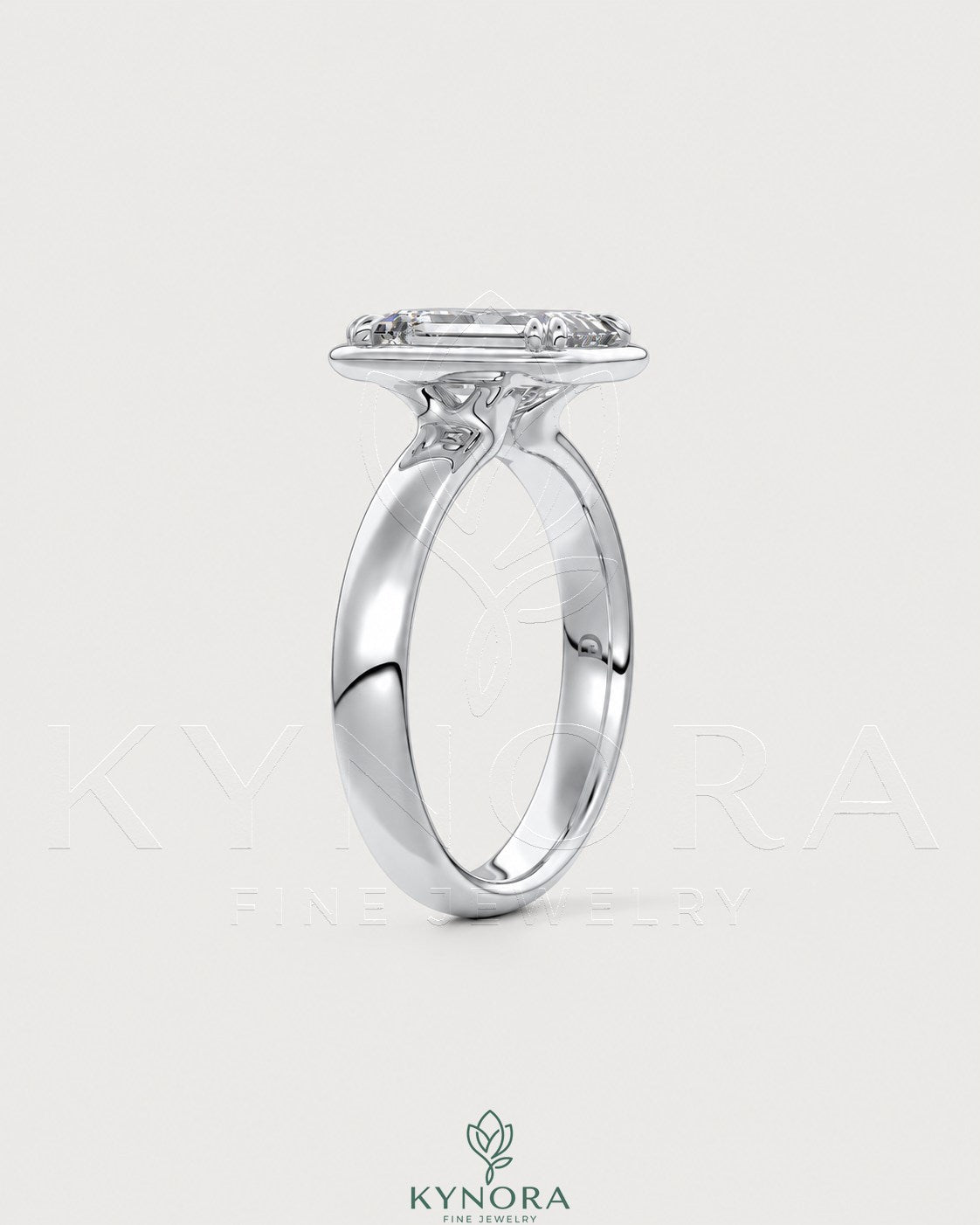 Emerald cut Moissanite bezel engagement ring in 925 silver with a sleek design, featuring a sparkling central stone and smooth band.
