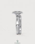 Emerald cut Moissanite bezel engagement ring in 925 silver with a sleek, modern design from Kynora CJ.