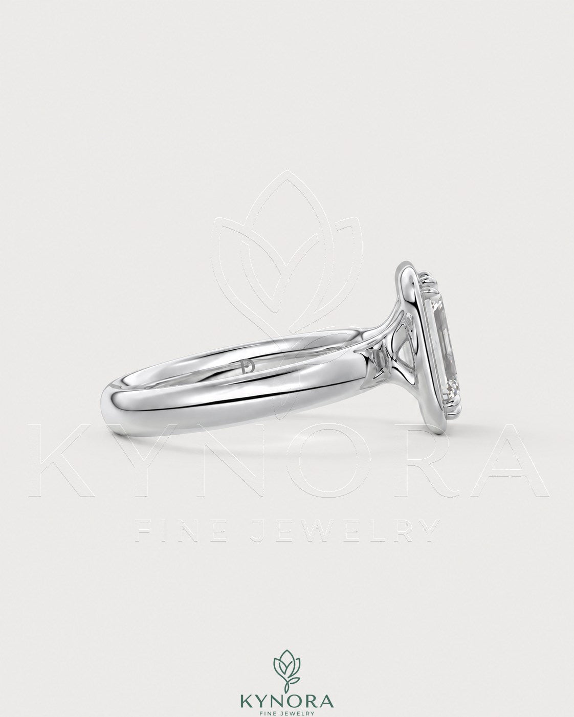 Emerald cut Moissanite bezel engagement ring in 925 silver with a sleek, modern design, featuring a sparkling center stone.