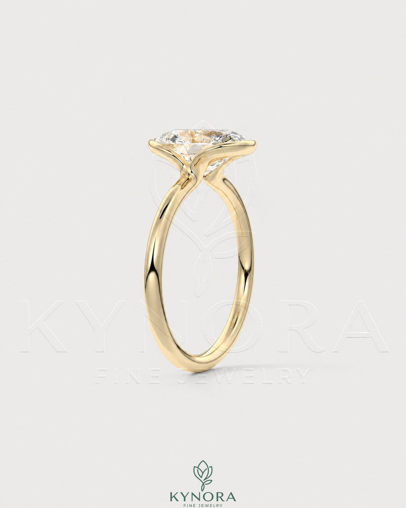 Oval Moissanite half-bezel solitaire engagement ring in 925 silver, featuring a sleek design and sparkling stone setting.
