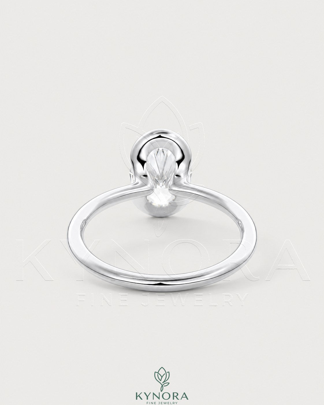 Oval moissanite half-bezel solitaire engagement ring in 925 silver featuring a sleek, elegant design with a prominent central stone.