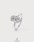 Oval moissanite half-bezel solitaire engagement ring in 925 silver with a sleek, elegant design from Kynora CJ.
