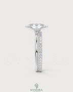 Oval moissanite half-bezel solitaire engagement ring in 925 silver with a sleek, modern design by Kynora CJ.