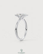 Radiant cut moissanite half-bezel engagement ring in 925 silver with detailed setting, showcasing elegant craftsmanship.