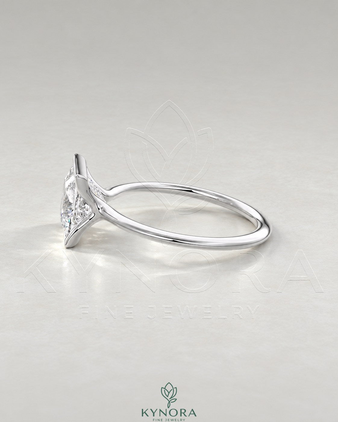 Princess cut moissanite half-bezel solitaire ring in 925 silver with a sleek design, featuring a sparkling center gemstone.
