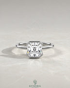 Asscher cut moissanite half-bezel solitaire ring in 925 silver, showcasing a sparkling gemstone set in a sleek bezel setting.